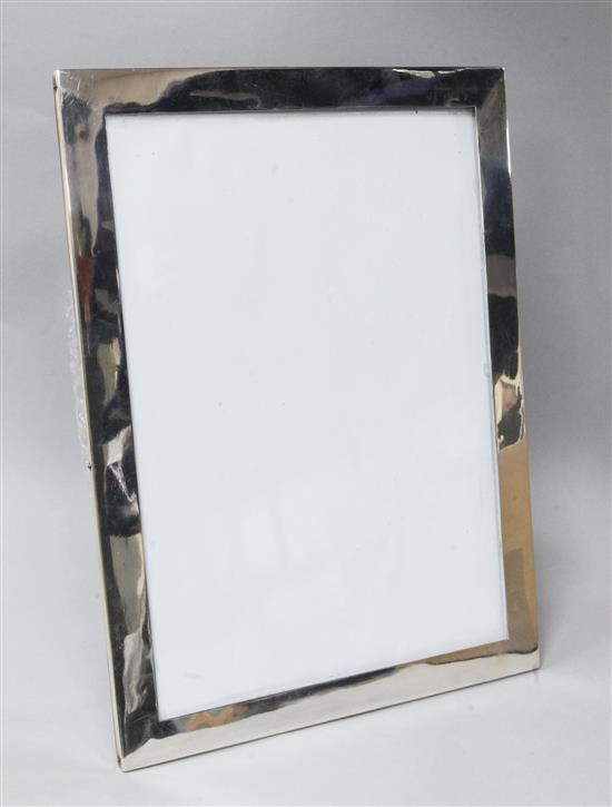 A large George V silver mounted photograph frame, Stokes, Ireland Ltd, Chester, 1915, 31.3cm.